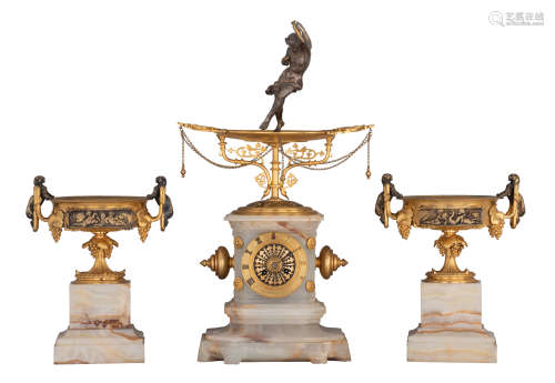 An onyx three-piece Neoclassical mantle clock, on top of the clock a gilt, silver-plated and enamell