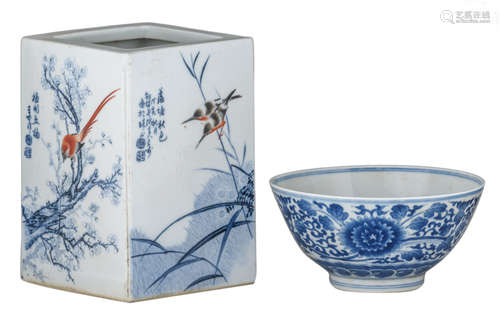 A Chinese blue and white 'lotus scroll' bowl, with a Kangxi mark. Added a Chinese polychrome brushpo