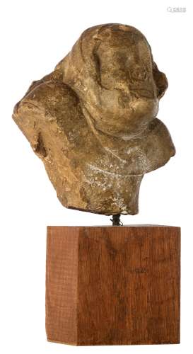 A Gothic sandstone ornamental fragment of a male figure, probably originating from a fireplace mante