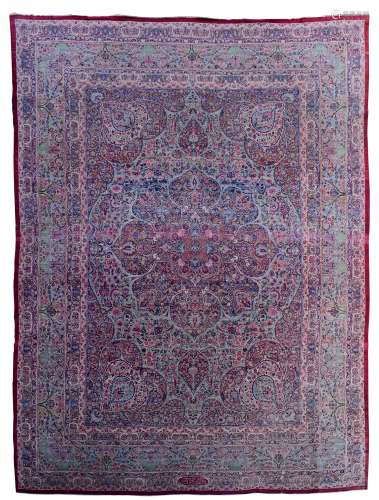 A fine Oriental rug, decorated with floral motifs, signed by the artist, silk, 663 x 494 cm