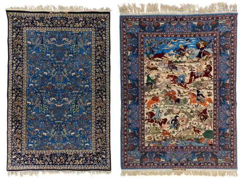 An Oriental Isphahan carpet, decorated with animals and birds in a landscape setting, signed, added: