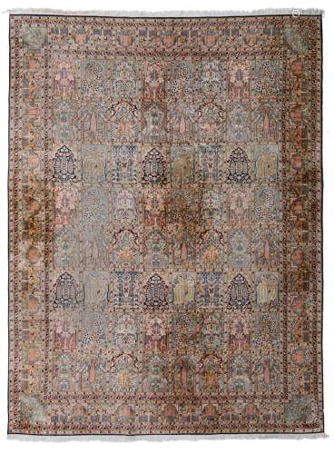An Oriental rug, decorated with architectural motifs, 276 x 370 cm