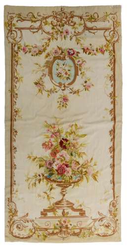 A French Aubusson rug decorated with a central flower vase, linen and silk, late 19thC, 281 x 138 cm