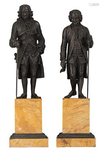 A pair of patinated bronze sculptures of Voltaire and Rousseau, after J.A. Houdon, on a Sienna marbl