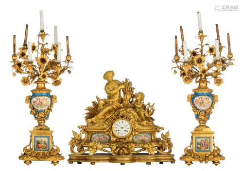 A very imposing Neoclassical ormolu bronze three-piece mantle clock, decorated with 'bleu c‚leste' g