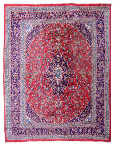 An Oriental rug, floral decorated, woollen, 295 x 380 cm