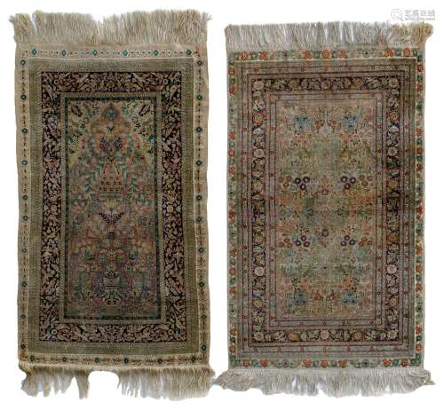 An Oriental silk rug, decorated with flower vases and birds, 74 x 121,5 cm. Added a ditto Oriental s