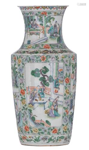 A Chinese floral decorated famille verte vase, the panels decorated with scenes from the daily life,