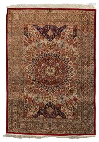 An Oriental rug, decorated with geometrical motifs, signed by the artist, 101,5 x 150,5 cm