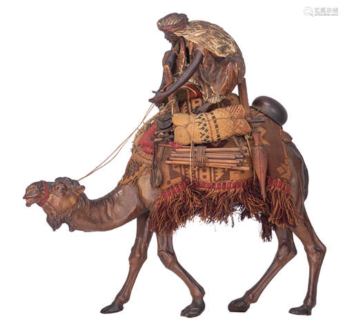 A cold painted plaster Arab on his camel, in the manner of Franz Bergman, Vienna, H 46 - W 47 cm