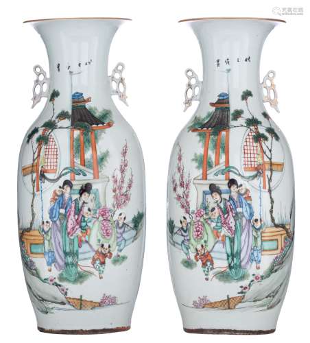 A pair of Chinese Qianjiang cai vases, decorated with playing children in a garden setting, the back