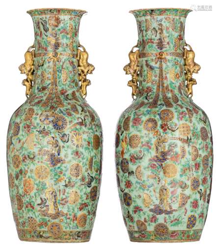 A pair of Chinese Canton famille rose on celadon ground vases, all over decorated with the Eight Imm