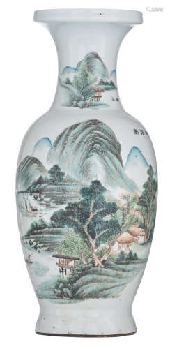 A Chinese Qianjiang cai vase, decorated with a mountainous river landscape, with a signed text at th