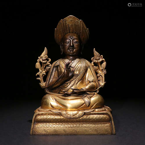 A GILT-BRONZE BUDDHA STATUE