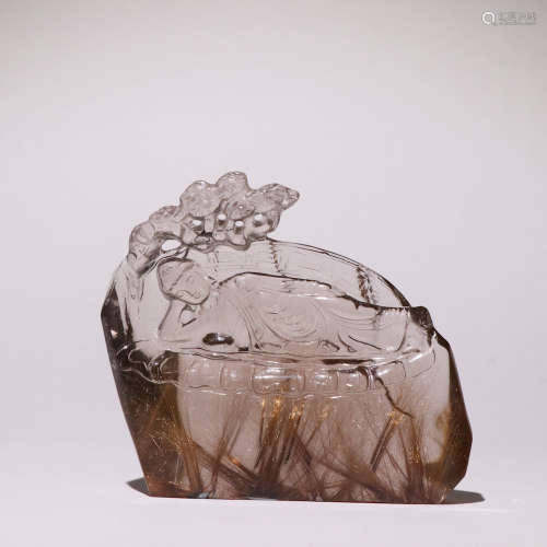 A NATURAL CRYSTAL CARVED FIGURE ORNAMENT