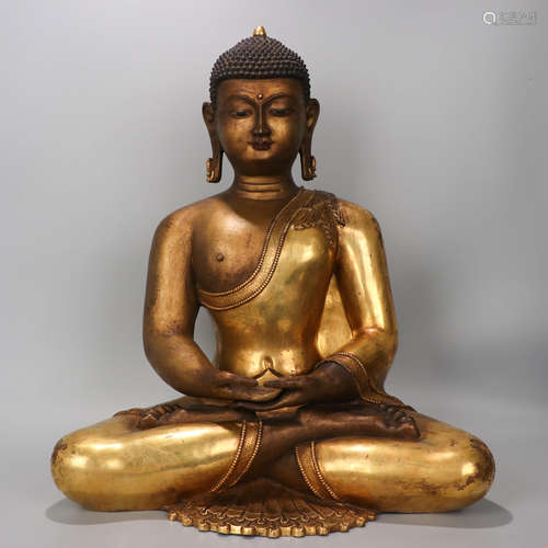 A GILT-BRONZE SEATED BUDDHA STATUE