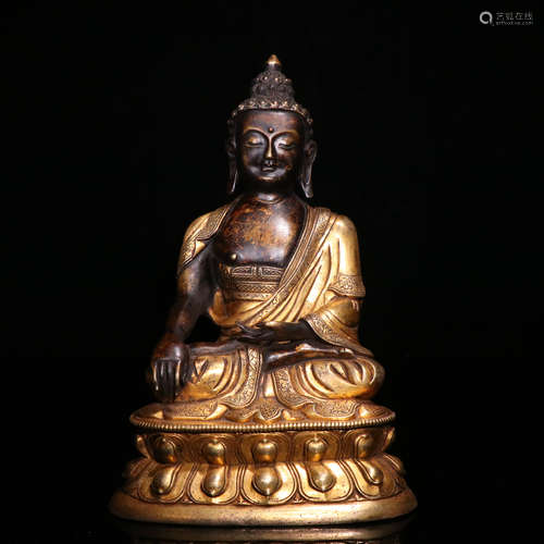 A GILT-BRONZE SEATED BUDDHA STATUE