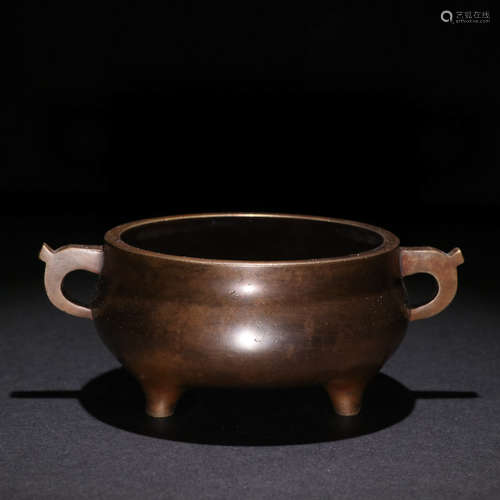 A BRONZE TRIPOD CENSER