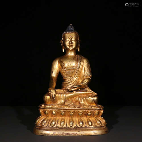 A GILT-BRONZE SEATED BUDDHA STATUE