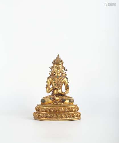 A Gilt Bronze Inlaid with Turquoise Buddha