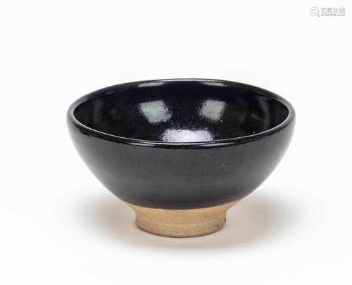 A BLACK GLAZED PORCELAIN CUP