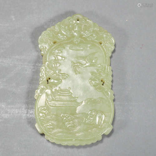 A YELLOW JADE PENDANT