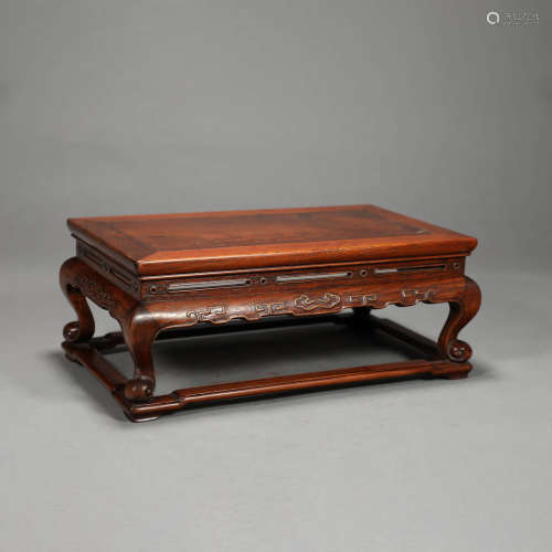 A FRAGRANT ROSEWOOD TABLE