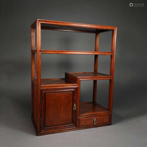 A FRAGRANT ROSEWOOD CABINET