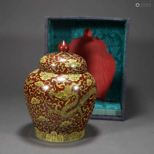 A RED GROUND YELLOW DRAGON PORCELAIN JAR AND COVER