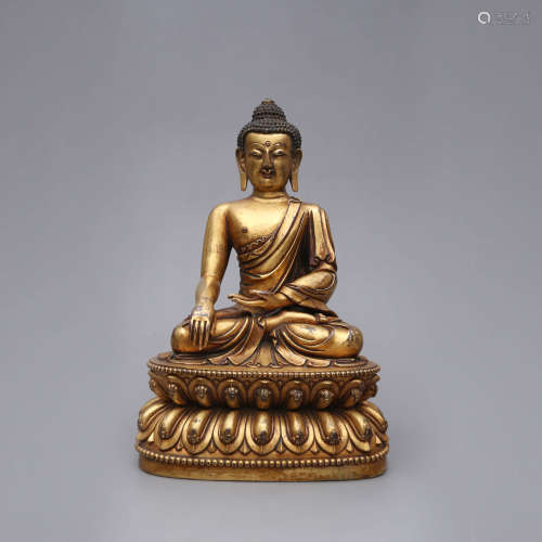 A Gilt Bronze Figure of Buddha Shakymuni