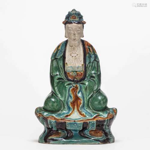 A Sancai Glazed Biscuit Seated Guanyin Figure