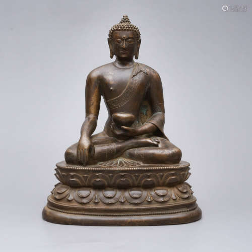 A Violet Gold Figure of Buddha Shakymuni