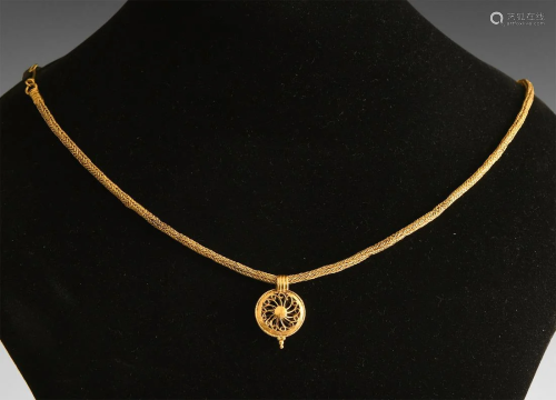 Roman Gold Necklace with Sun Whorl Pendant