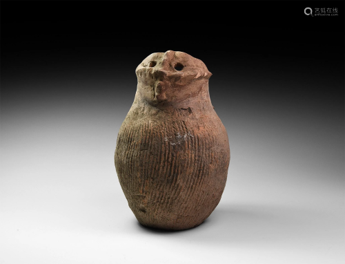 Neolithic Textured Greyware Jar with Human Face
