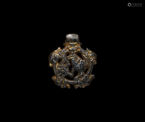 Viking Gilt-Silver Gripping Beast Pendant