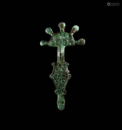 Radiate Bow Brooch with Zoomorphic Terminal
