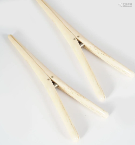 PAIR OF 19TH-CENTURY IVORY GLOVE STRETCHERS