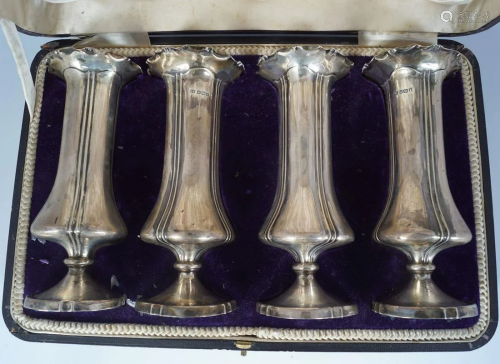 SET OF 4 SILVER VASES