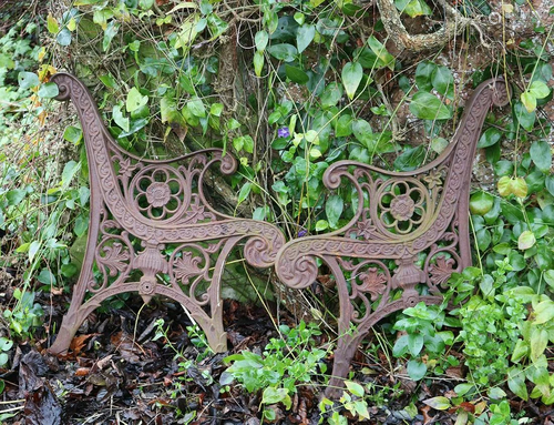 PAIR OF 19TH-CENTURY CAST IRON GARDEN SEAT ENDS