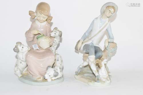 Lladro model of a young girl with puppies together with a Lladro model of a swan (2)