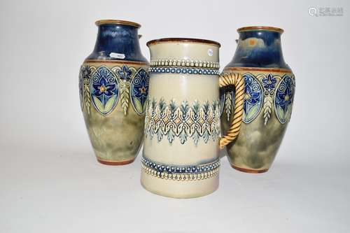 Pair of Royal Doulton vases, early 20th century, with a tube lined floral design, together with a