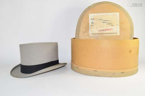 Grey coloured top hat in box by Moss Bros