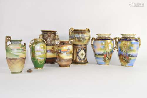 Group of seven Noritake vases, all decorated in typical fashion with landscape scenes and some