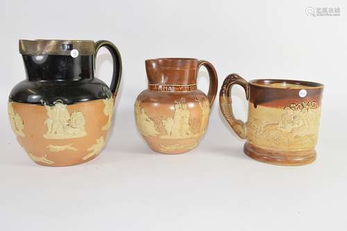 Group of three Royal Doulton Harvest ware jugs including one to commemorate the Jubilee of Queen