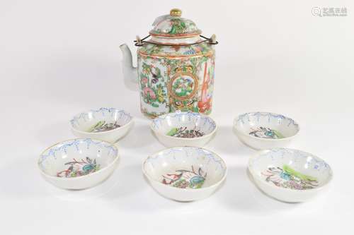 Chinese porcelain tea pot in Cantonese style decorated in famille rose, and a group of six small