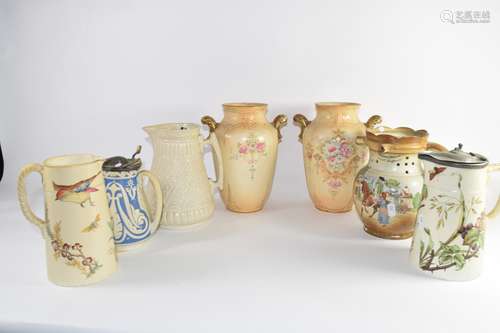 Crown Devon pair of vases with floral decoration, together with a Burleigh ware puzzle jug with