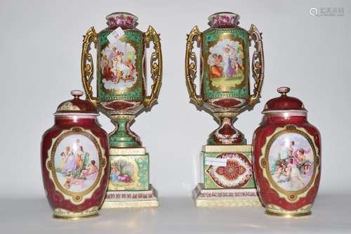 Group of Continental porcelain wares including a pair of vases with covers and decorated with