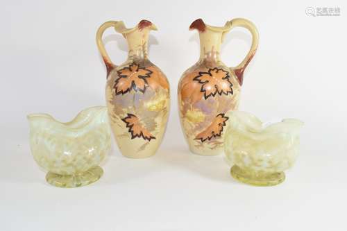 Pair of Vaseline glass vases together with two glass ewers painted with floral decoration, 22cm high