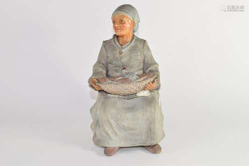 Late 19th century Continental pottery tobacco jar modelled as a fish seller, 30cm high