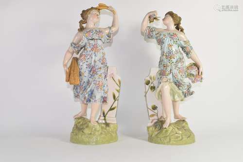 Pair of Continental porcelain figures, probably Sitzendorf, decorated in Meissen style, both figures